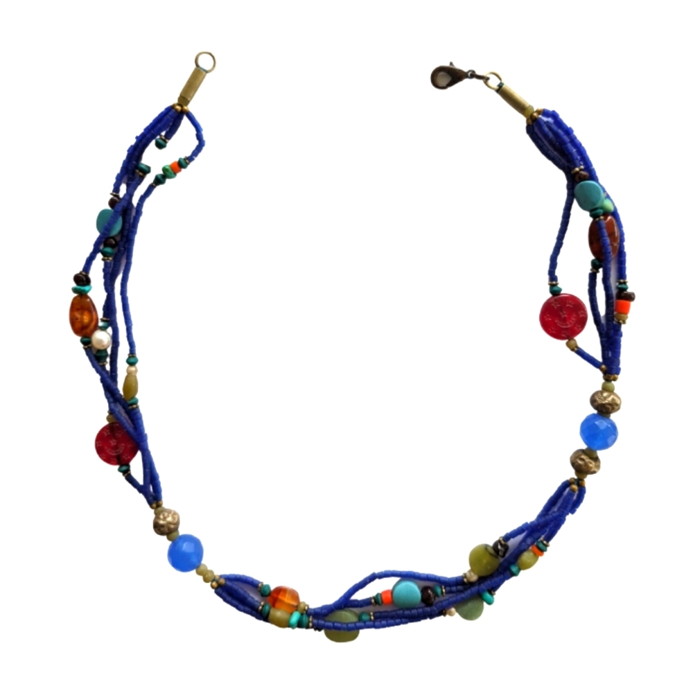 Richly colored multi-strand necklace on a dark blue base